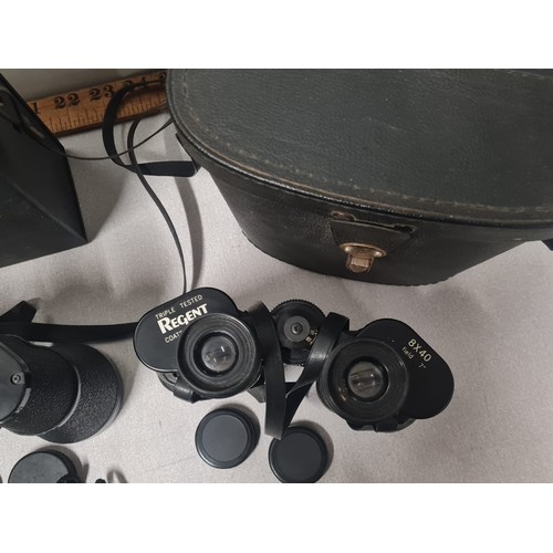 104 - 3 x vintage Kodak cameras and 3 pairs of binoculars with cases to include Regent etc.