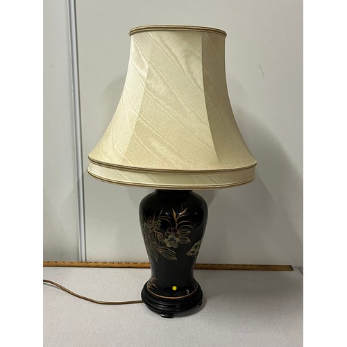 143 - Oriental style table lamp.
72cm inc shade.