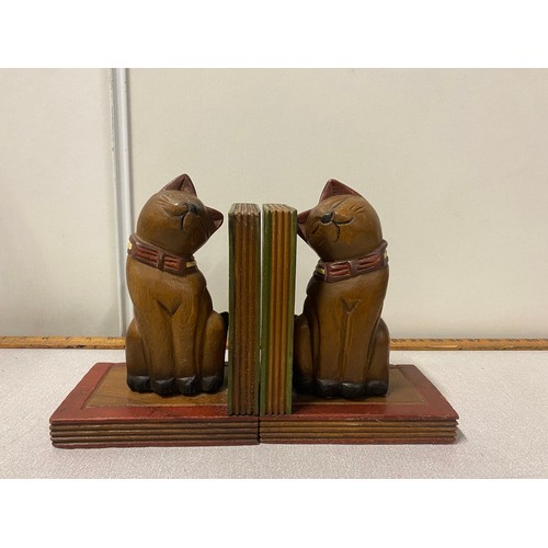 3 - Pair of wooden cat bookends along with carved wooden cat shelf ornament.