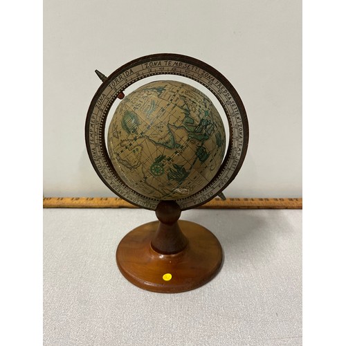 10 - Vintage desk globe on wooden stand. Slight damage to globe.
24cm h