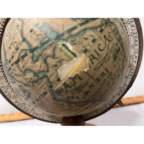 10 - Vintage desk globe on wooden stand. Slight damage to globe.
24cm h