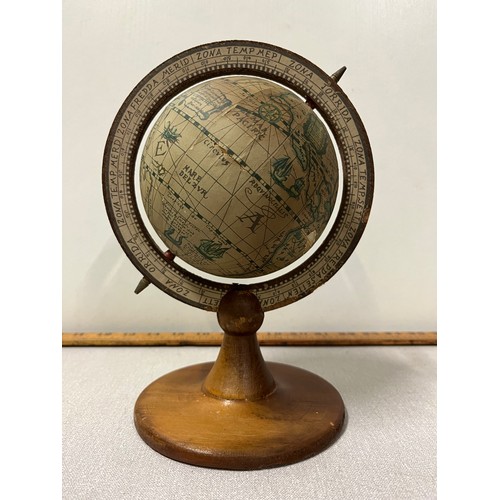 10 - Vintage desk globe on wooden stand. Slight damage to globe.
24cm h