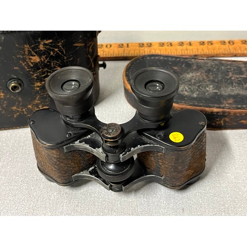 114 - Pair of military binoculars in original case.