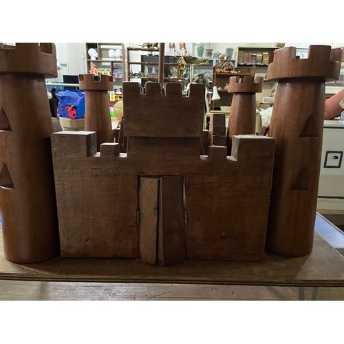 128 - Large solid wooden hand crafted kids fort/castle. Comes in large solid wood chest.
Fort approx 100cm... 