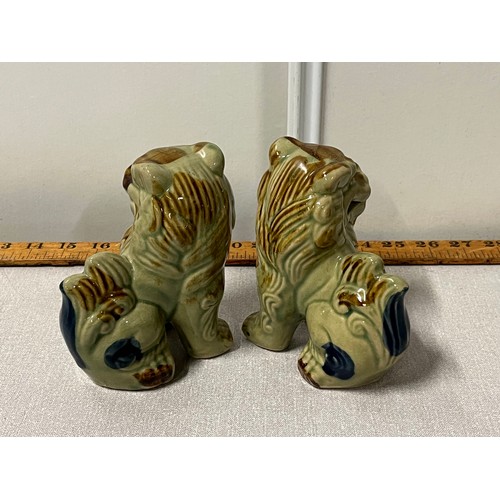 83 - Pair of ceramic glazed Foo dogs.
13cm h