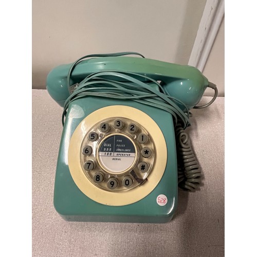 95 - Vintage turquoise telephone.