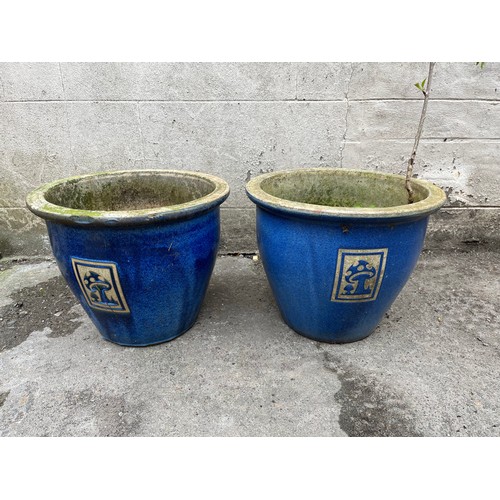 358 - Pair of blue glazed garden planters with toadstool design.
30cm h