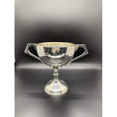 4 - Hallmarked solid silver two handled golf trophy cup dated 1949.
197g
14.5cm h