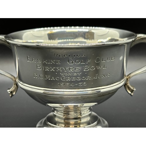 6 - Hallmarked solid silver two handled trophy cup. Dated 1934/35
157g
7cm h