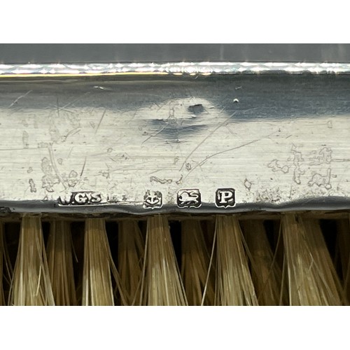 162 - Pair of hallmarked silver clothes brushes.