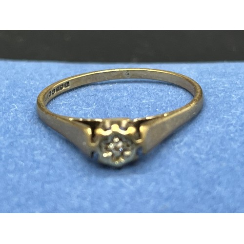 168 - 9ct gold and diamond ring.