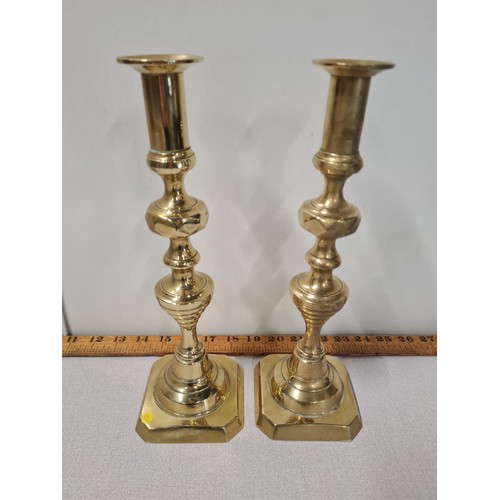 175 - Pair of brass candle sticks.
30cm h