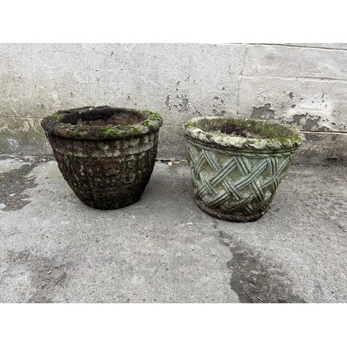 176 - Two antique stone garden planters.