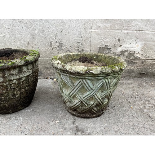 176 - Two antique stone garden planters.