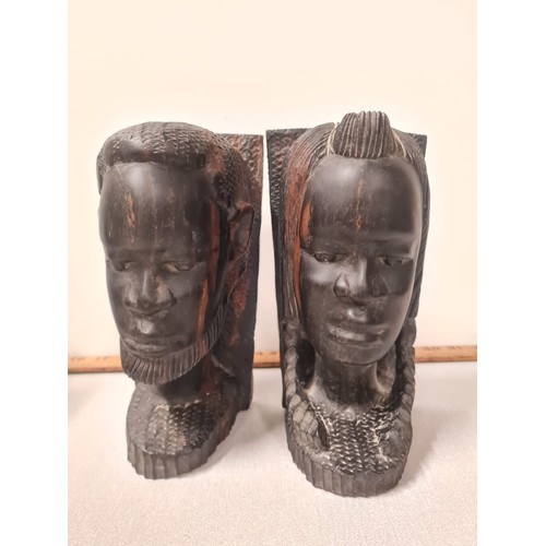 34 - Two sets of vintage carved African bookends.