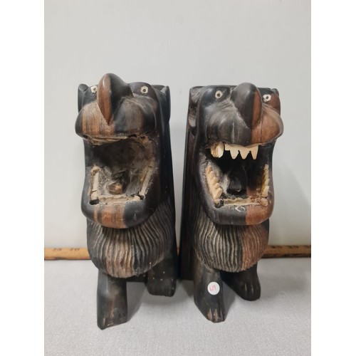 34 - Two sets of vintage carved African bookends.