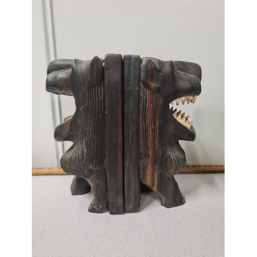 34 - Two sets of vintage carved African bookends.