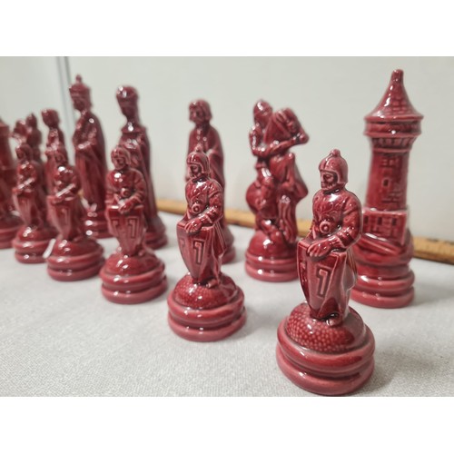 35 - 32 piece ceramic chess set.