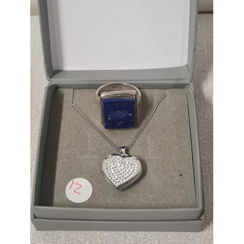 51B - Silver hallmarked gem set ring & silver chain & heart pendant.