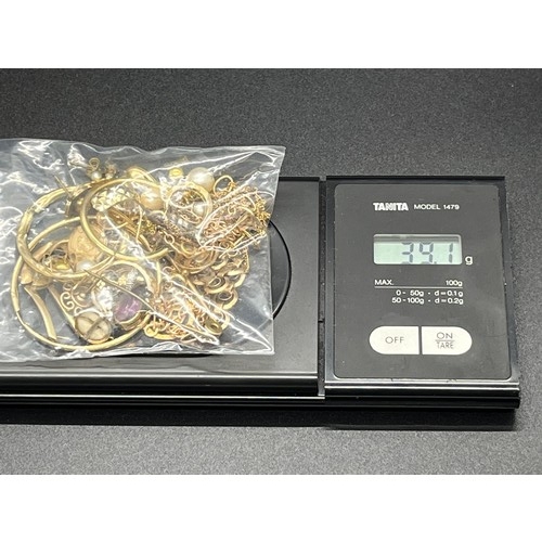 7 - 39.1 grams of mostly scrap gold.