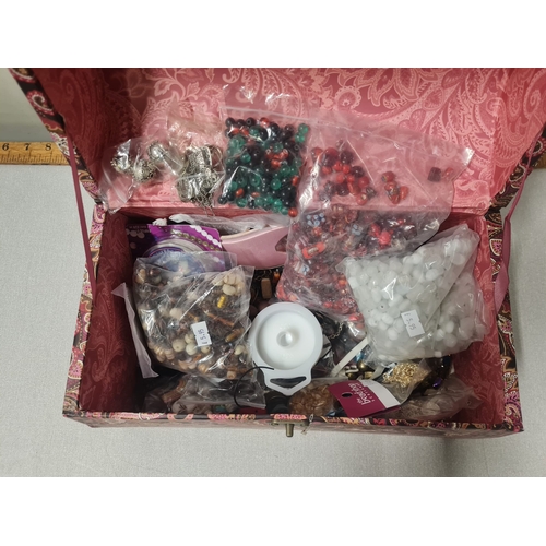 150A - Case of jewellery making items to include stones, beads & clasps etc.