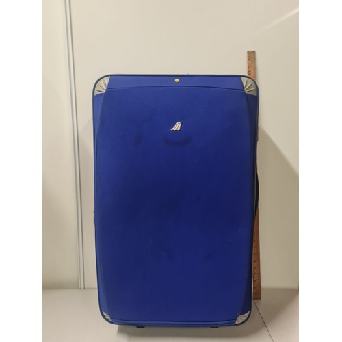 563 - large blue suitcase