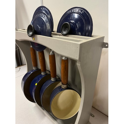 154 - Cast Iron Chasseur pots with 3 lids in wooden storage cabinet.