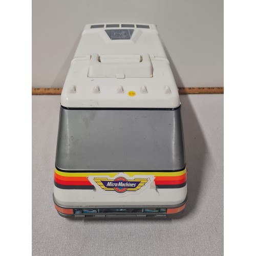 209 - Vintage Galoob Micro Machines Super Van City & contents.
40cm L x 18cm H x 17cm W Closed