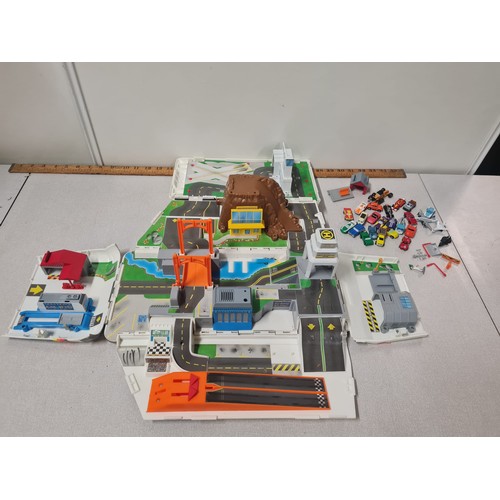 209 - Vintage Galoob Micro Machines Super Van City & contents.
40cm L x 18cm H x 17cm W Closed