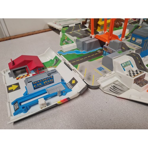 209 - Vintage Galoob Micro Machines Super Van City & contents.
40cm L x 18cm H x 17cm W Closed