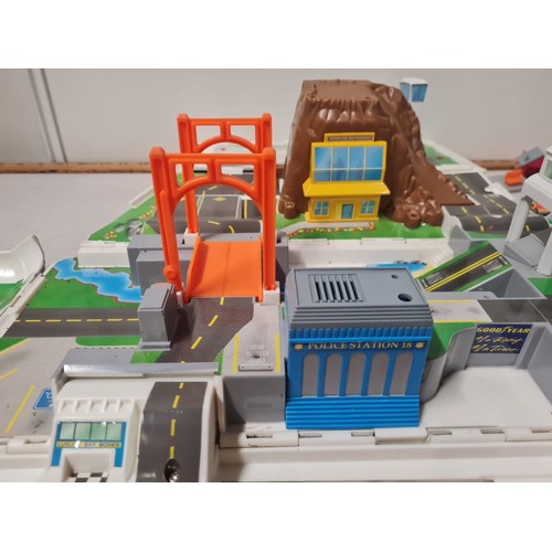 209 - Vintage Galoob Micro Machines Super Van City & contents.
40cm L x 18cm H x 17cm W Closed