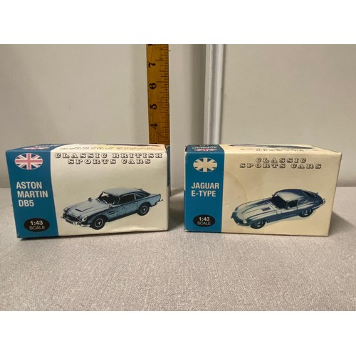 193 - Collection of boxed model cars to include classic British sports cars Aston Martin DB5 etc.