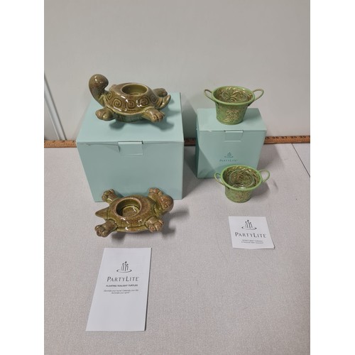 296 - Pair of new Partylite floating tea-light turtles and pair of verdant lights candle holders.