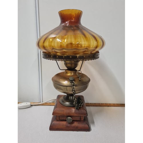 387 - Amber glass and brass converted oil lamp.
53cm h