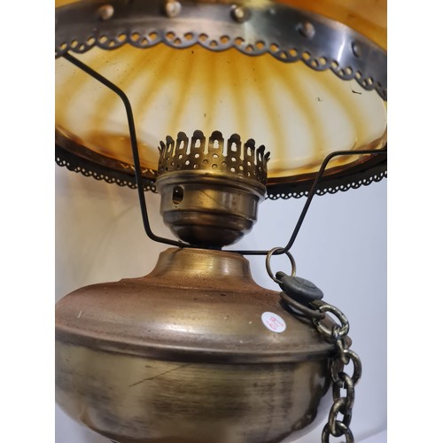 387 - Amber glass and brass converted oil lamp.
53cm h