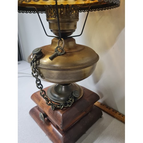 387 - Amber glass and brass converted oil lamp.
53cm h