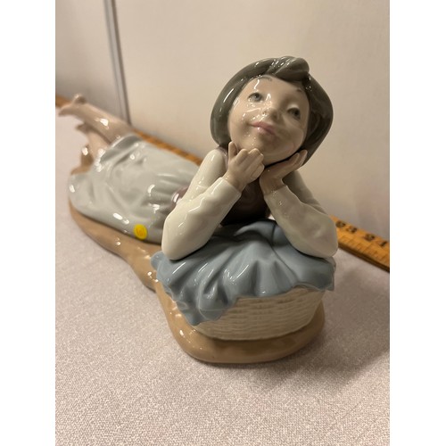 66 - Large Nao figuring of girl lying down. 
32cm L