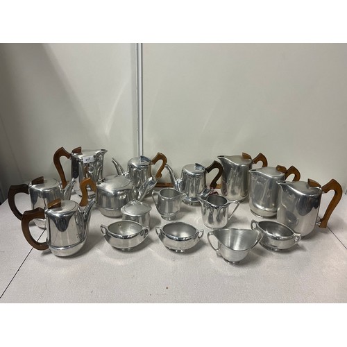 252 - Quantity of 16 Piquot ware teapots etc.