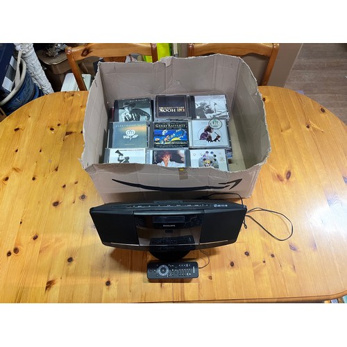 372 - Philips micro music system model DCM2055, to include selection of CDs