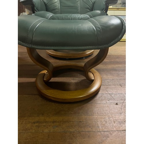 211 - Ekorness stressless reclining chair & stool.