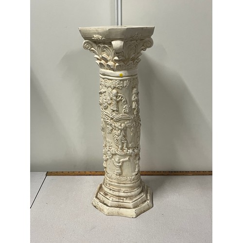 313 - Ceramic column with cherubs.  
64cm h