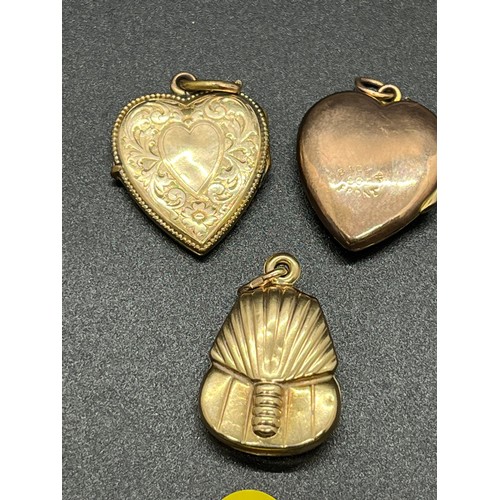 18 - 2 9ct gold front & back lockets & 1 9ct Tutankhamun pendant. 
7.96g