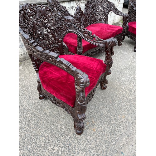 384 - an asian highly carved sofa & 2 chairs with red velvet upholstery