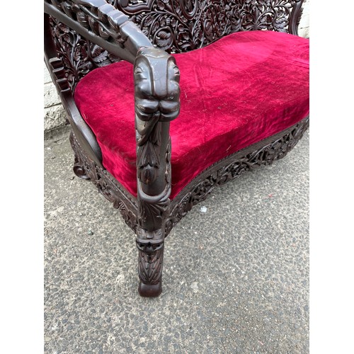 384 - an asian highly carved sofa & 2 chairs with red velvet upholstery