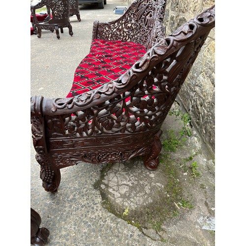 385 - an asian highly carved sofa & 2 chairs with red velvet upholstery