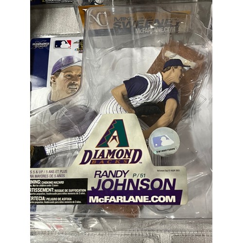 93 - 6 mcfarlanes sports boxed baseball figures to include randy johnson, chipper jones etc