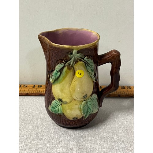 566 - Small majolica jug