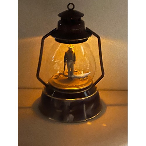 256 - Ardleigh Elliot John Wayne An American Legend Illuminated Lantern.
34cm h