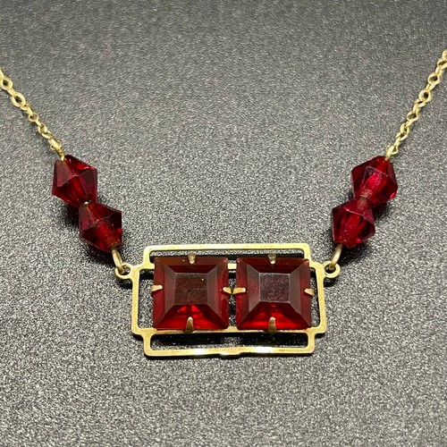 49 - 9ct red gem set necklace 2.3g