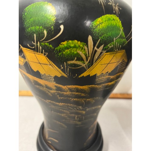 55 - Pair of large black lacquered oriental vases.
38cm h